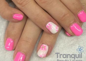 Pink and white nail art, with blooming flowers