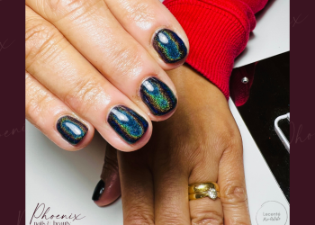 Black gel polish with rainbow chrome on short natural nails